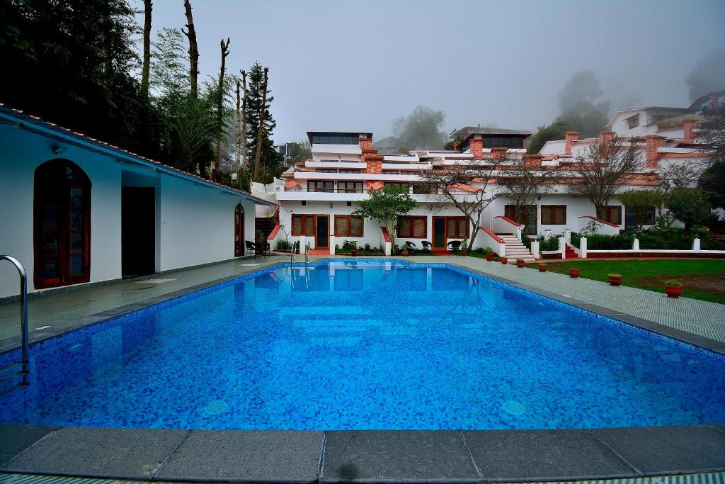 Bazén v ubytování Kodai Resort Hotel, Kodaikanal nebo v jeho okolí