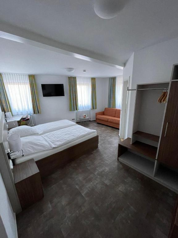 Postel nebo postele na pokoji v ubytování Hotel Meyer