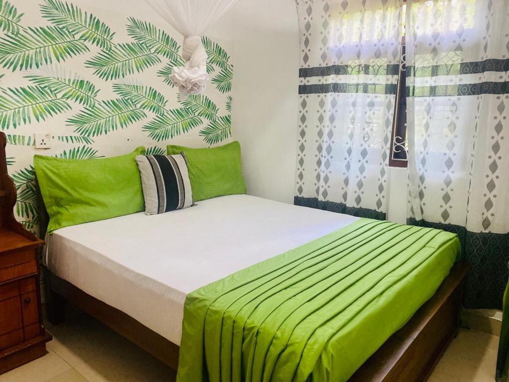 Postel nebo postele na pokoji v ubytování Village feel home stay