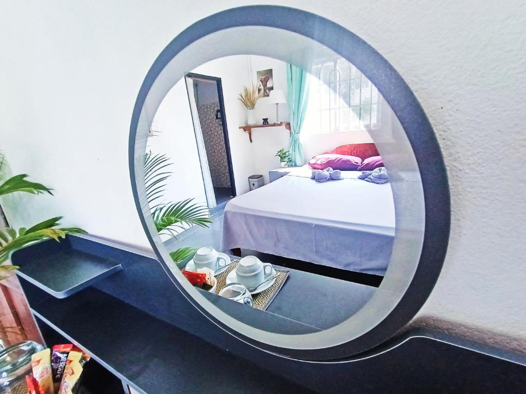 Postel nebo postele na pokoji v ubytování Sam's Guesthouse M'Pai Bay