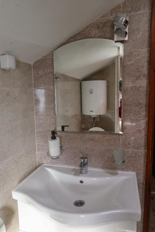 Koupelna v ubytování Studio Apartments Maksimović