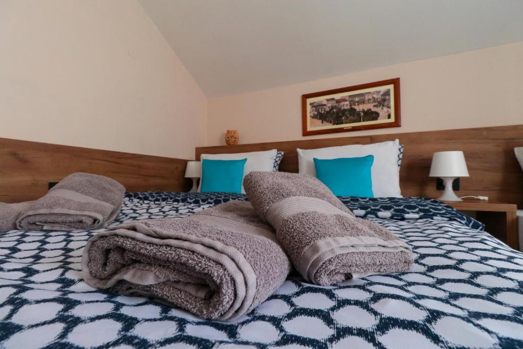 Postel nebo postele na pokoji v ubytování Studio Apartments Maksimović
