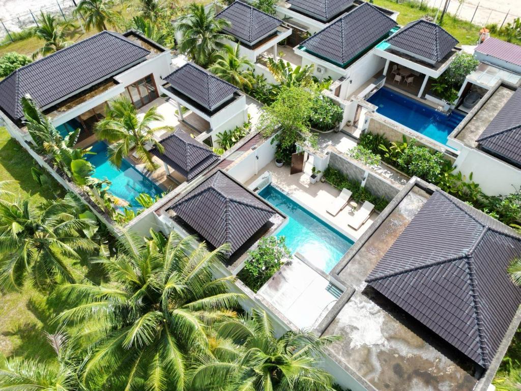 an aerial view of a villa with a swimming pool at Ream YoHo Resort in Sihanoukville