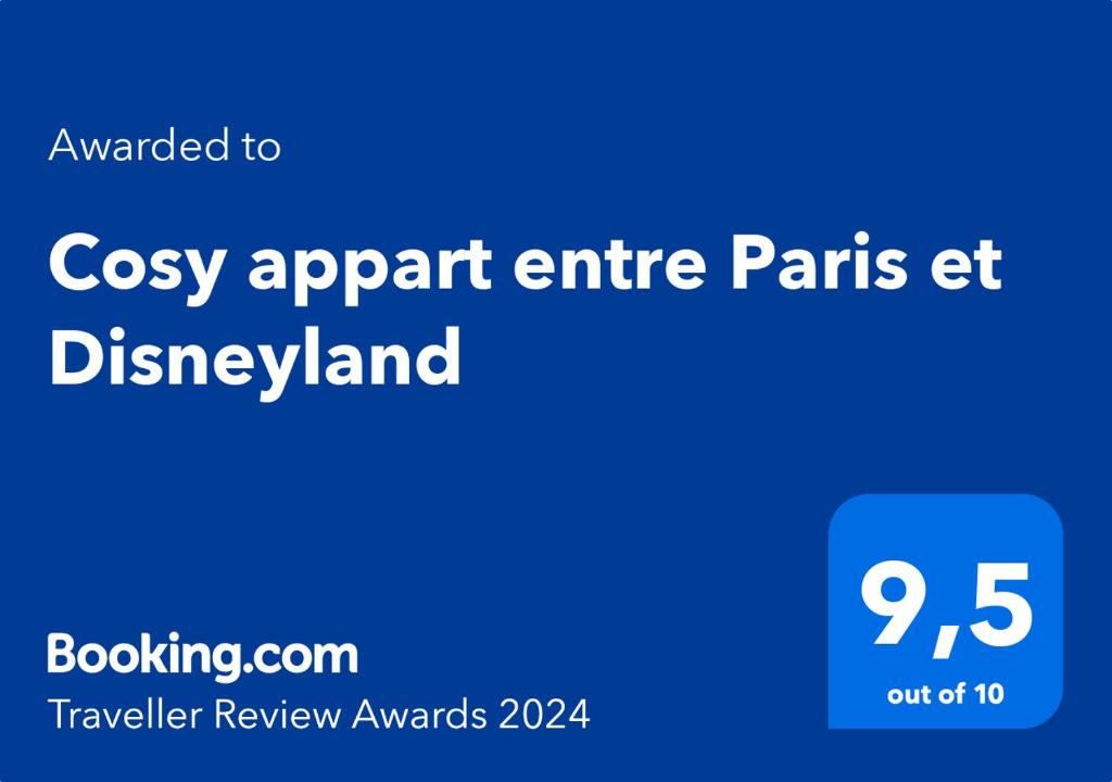 Niebieski znak ze słowami przytulnymi w całym parku w Disneyland w obiekcie Cosy appart entre Paris et Disneyland w mieście Villiers-sur-Marne