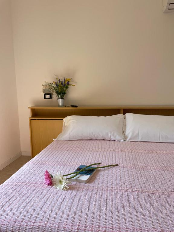 Postel nebo postele na pokoji v ubytování HOTEL LA PLAYA