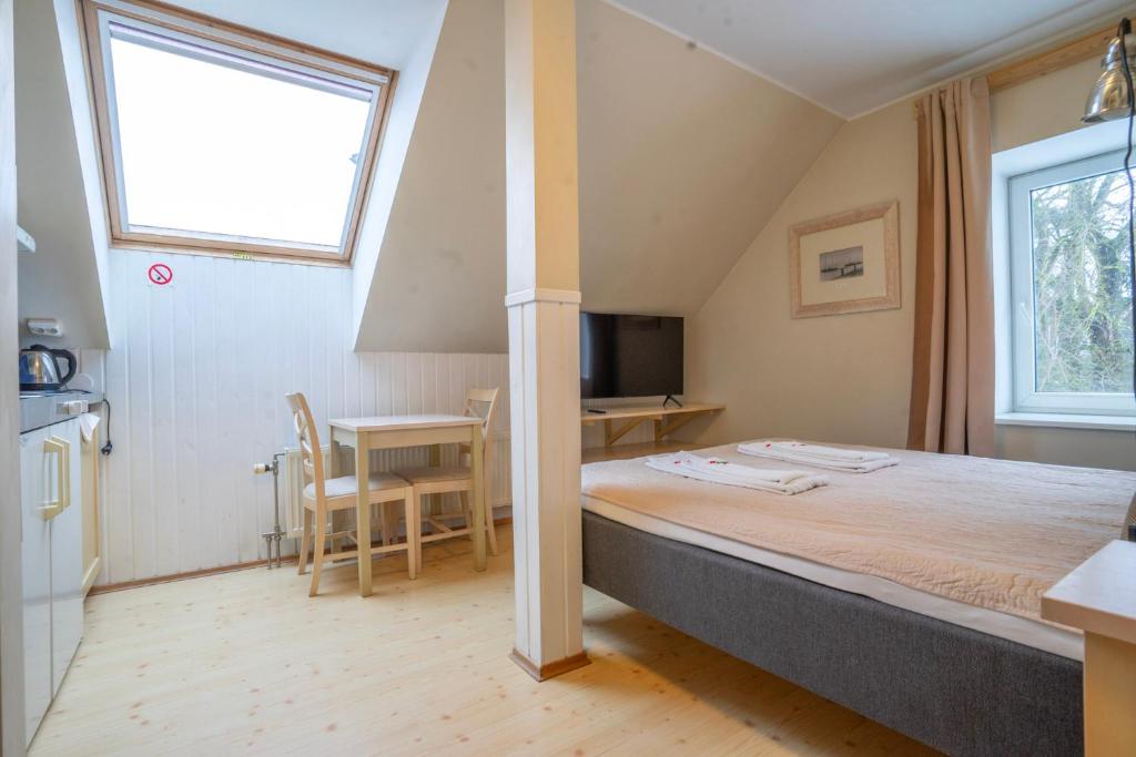 Postel nebo postele na pokoji v ubytování Kongo Hotel