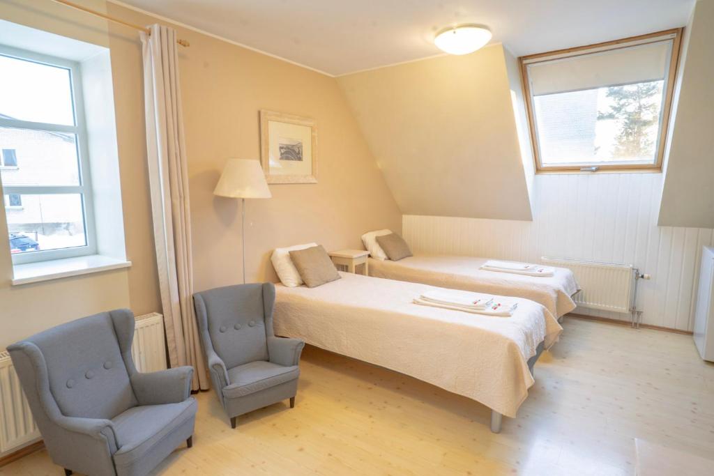 Postel nebo postele na pokoji v ubytování Kongo Hotel