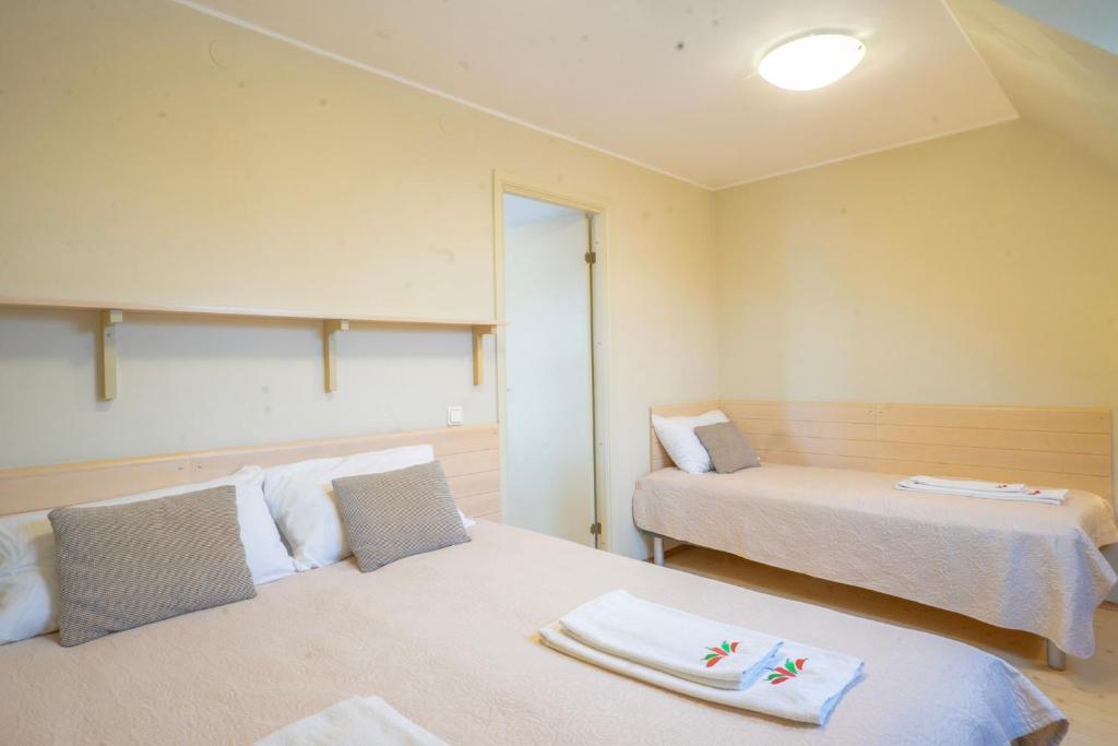 Postel nebo postele na pokoji v ubytování Kongo Hotel