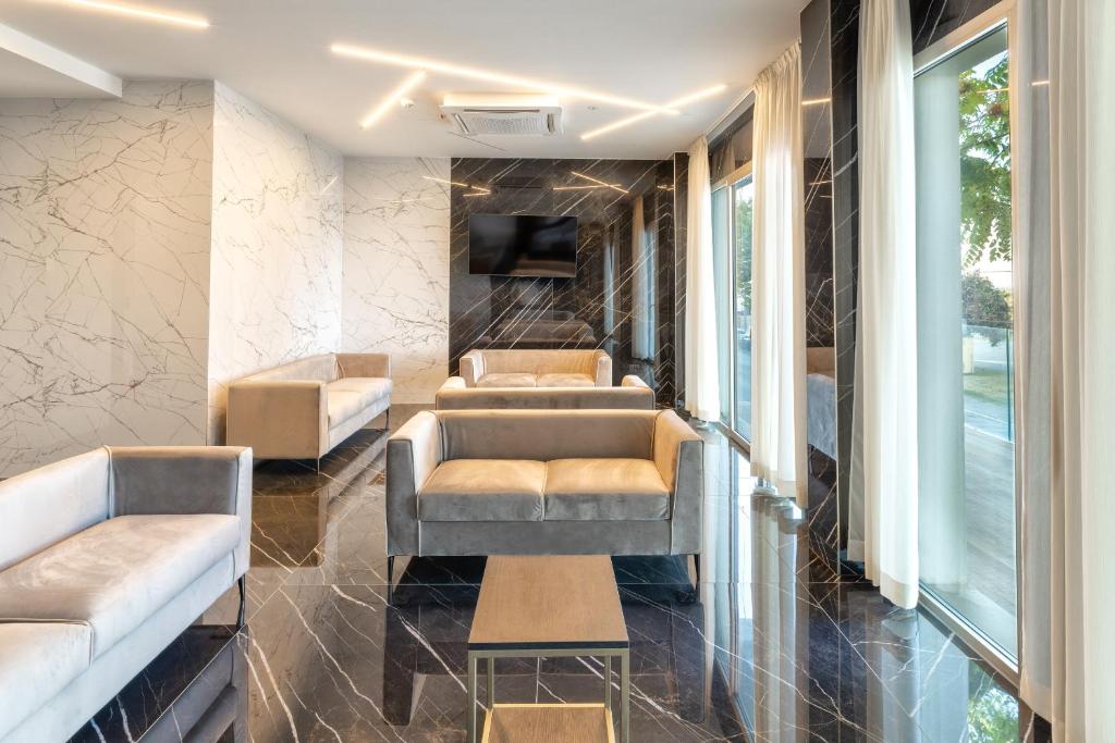 Posezení v ubytování Hotel Mondial