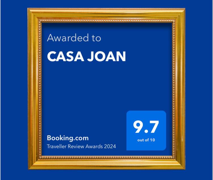a picture frame with the text awarded to csa jani at CASA JOAN in Elche