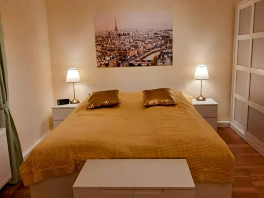 Postel nebo postele na pokoji v ubytování Schöne Ferienwohnung mit Balkon und Garten