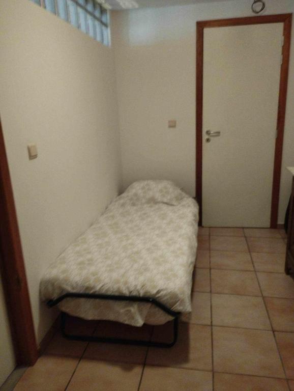 Postel nebo postele na pokoji v ubytování Gîte du Cheval Blanc à Houmont