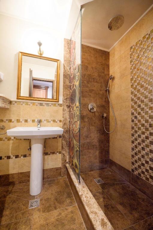 Koupelna v ubytování Hotel Iris-Mimoza