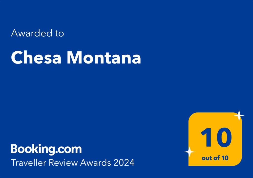 une boîte jaune avec les mots chica montana sur elle dans l'établissement Chesa Montana, à Rânca