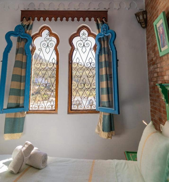 Postel nebo postele na pokoji v ubytování Casa Sabila