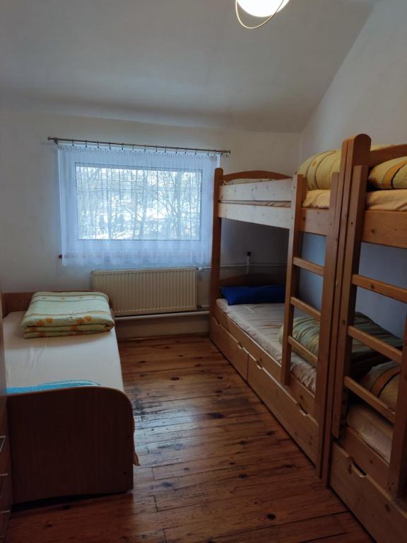 Postel nebo postele na pokoji v ubytování Magnificat