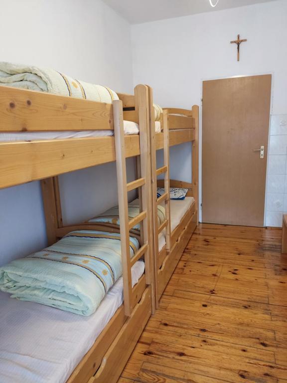 Postel nebo postele na pokoji v ubytování Magnificat