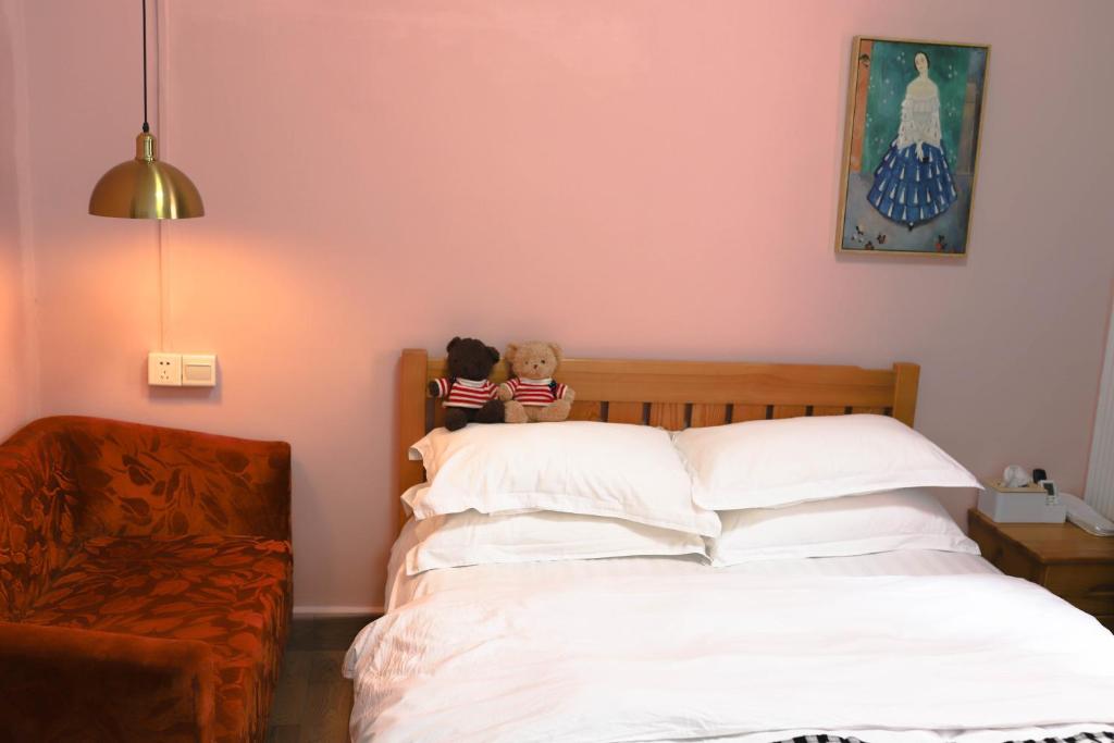 Tempat tidur dalam kamar di Changsha Fuxiangyuan International Hostel