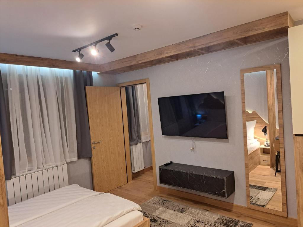 TV a/nebo společenská místnost v ubytování Aparthotel Vucko Jahorina NEW 451