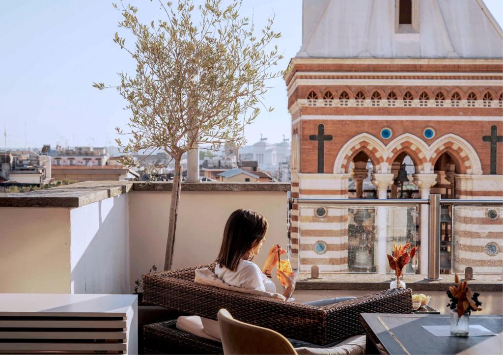Un balcón o terraza de La Griffe Hotel Roma