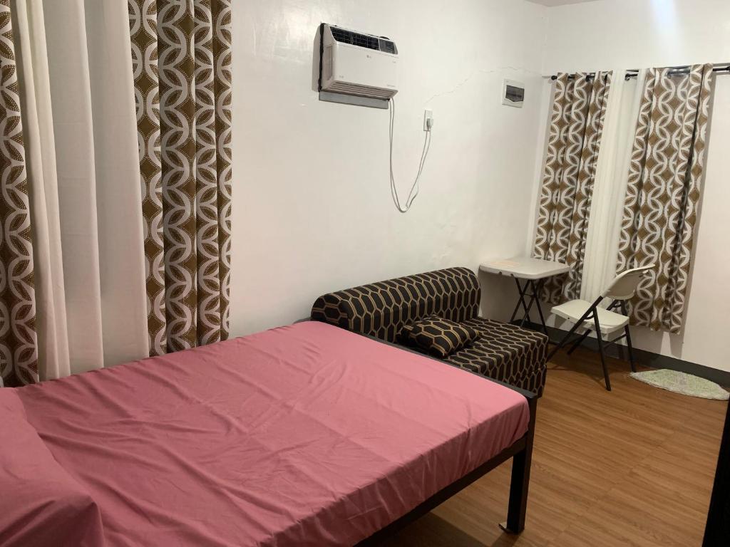 Postel nebo postele na pokoji v ubytování Capaclan Centro Private Room