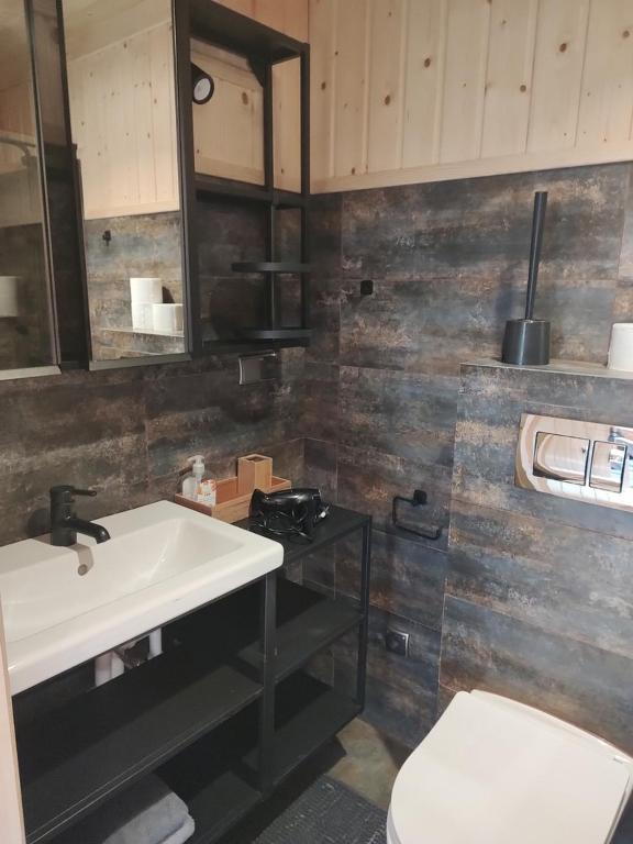 Koupelna v ubytování Apartamenty Leśna Przystań