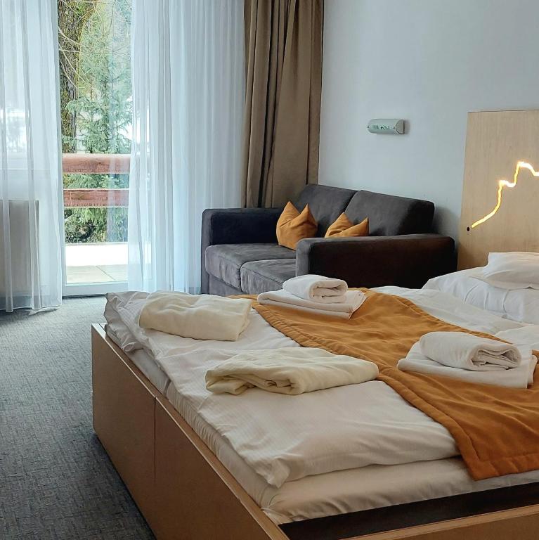 Postel nebo postele na pokoji v ubytování Hotel Diery