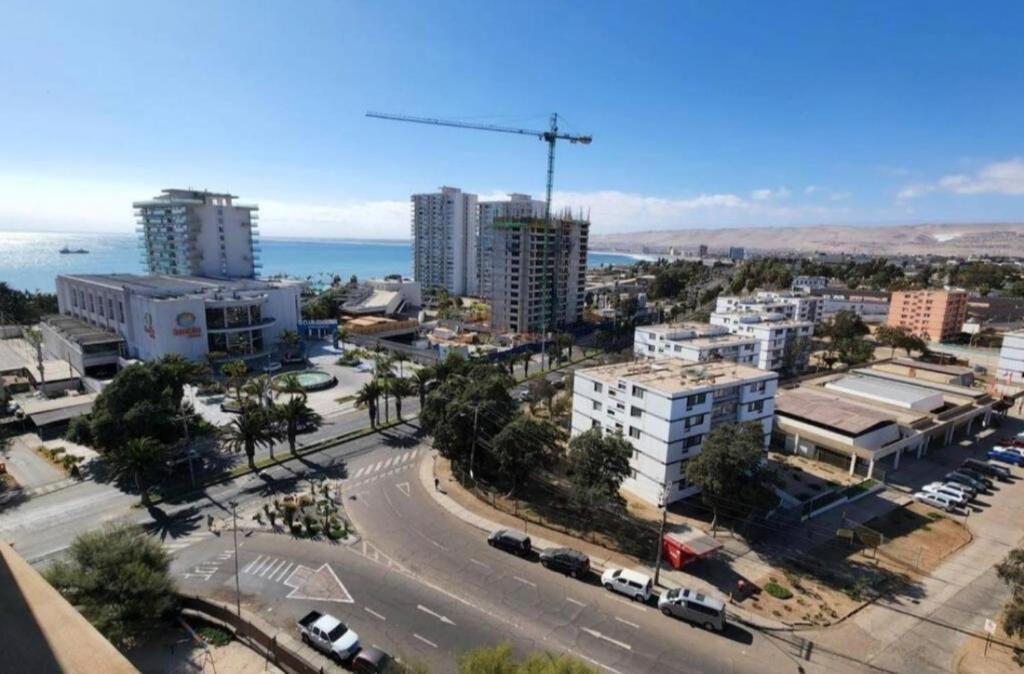 an aerial view of a city with buildings and a street at Departamento Frente al Casino Luckia 3H 2B in Arica