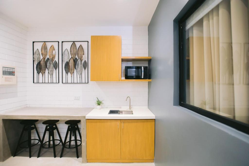 Kuchyň nebo kuchyňský kout v ubytování 10 Oxford Residences