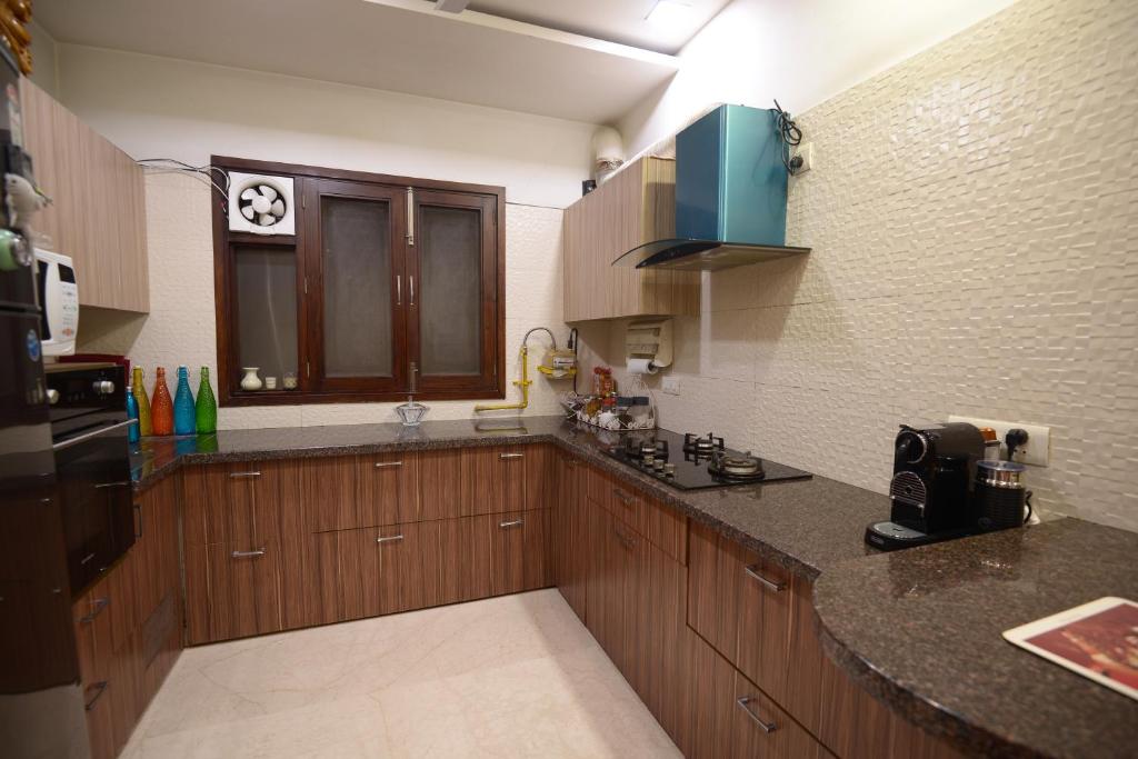 Kuchyň nebo kuchyňský kout v ubytování Pacation Home Stay