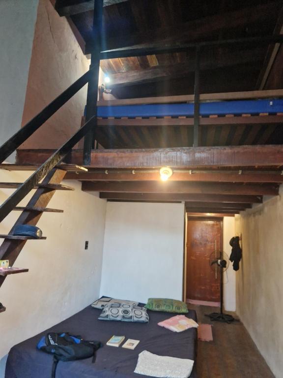 Postel nebo postele na pokoji v ubytování Fusion Guesthouse
