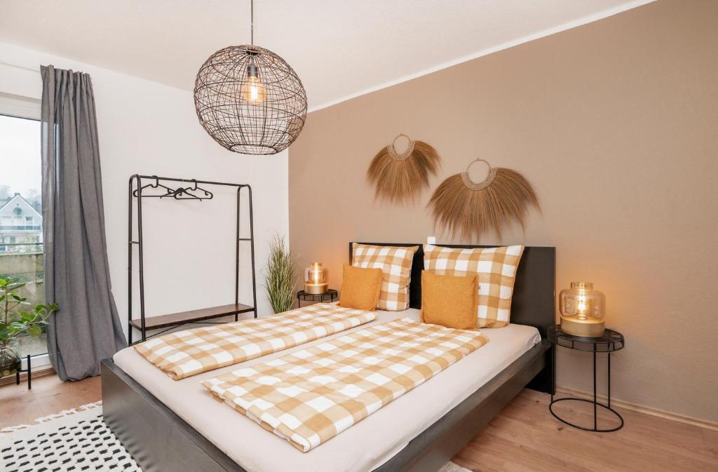 Cama ou camas em um quarto em Kurzzeitglück 24h Self Check-In E03
