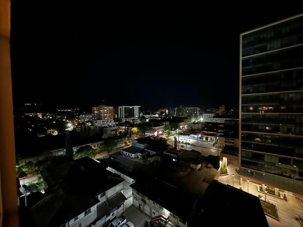 a view of a city at night with buildings at Departamento en centro de talca in Talca
