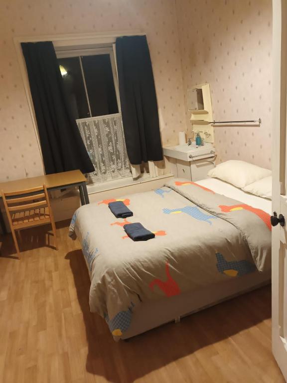 Voodi või voodid majutusasutuse Presentation Convent toas
