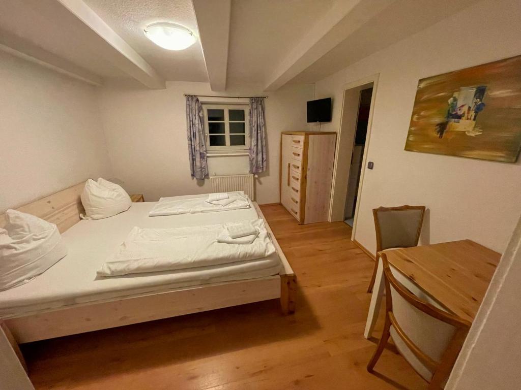Postel nebo postele na pokoji v ubytování Nobis Krug