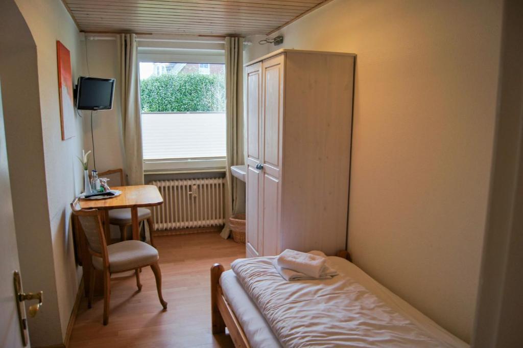 Postel nebo postele na pokoji v ubytování Nobis Krug