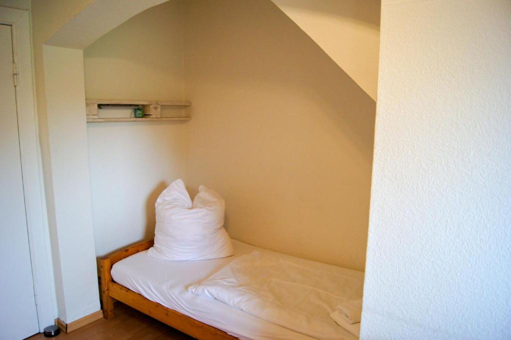 Postel nebo postele na pokoji v ubytování Nobis Krug