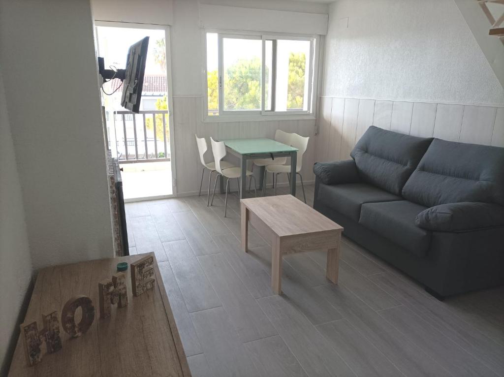 Posezení v ubytování Apartamento con terraza privada y piscinas