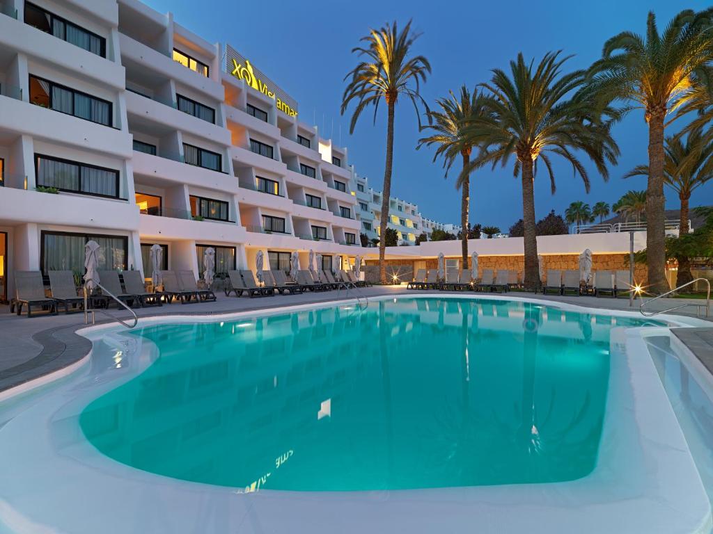 The swimming pool at or close to XQ Vistamar