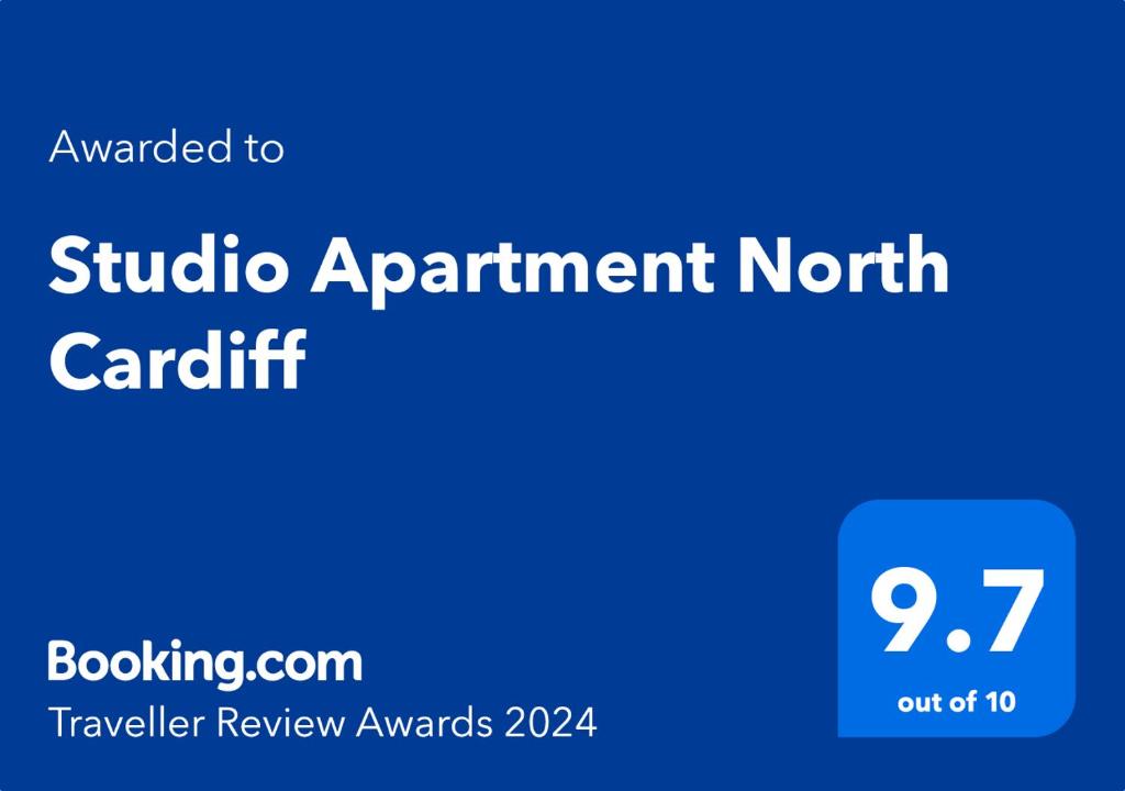 a blue sign that reads studio apartment north carutherford at Studio Apartment North Cardiff in Cardiff