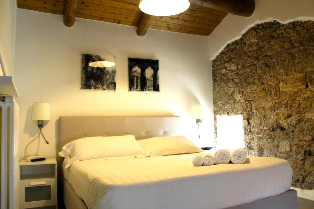 Postel nebo postele na pokoji v ubytování Casa Rubini