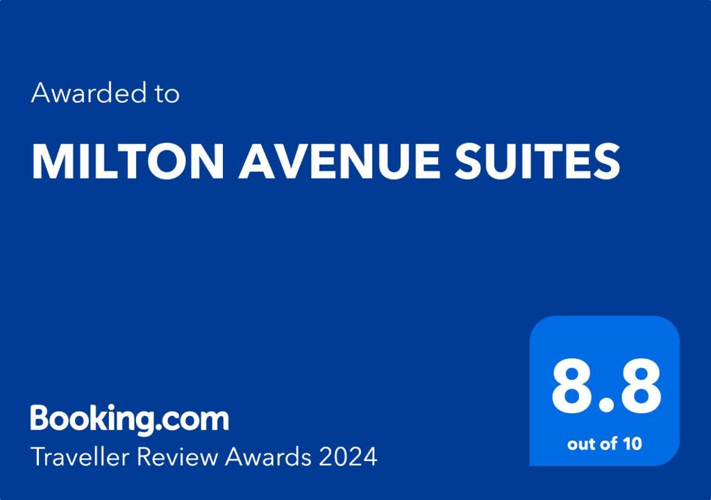 a blue square with the text million insurance switches at MILTON AVENUE SUITES in Accra