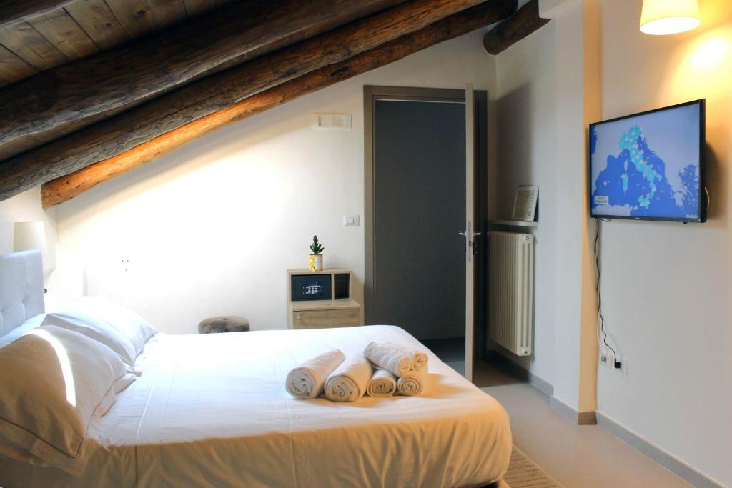 Postel nebo postele na pokoji v ubytování Casa Rubini