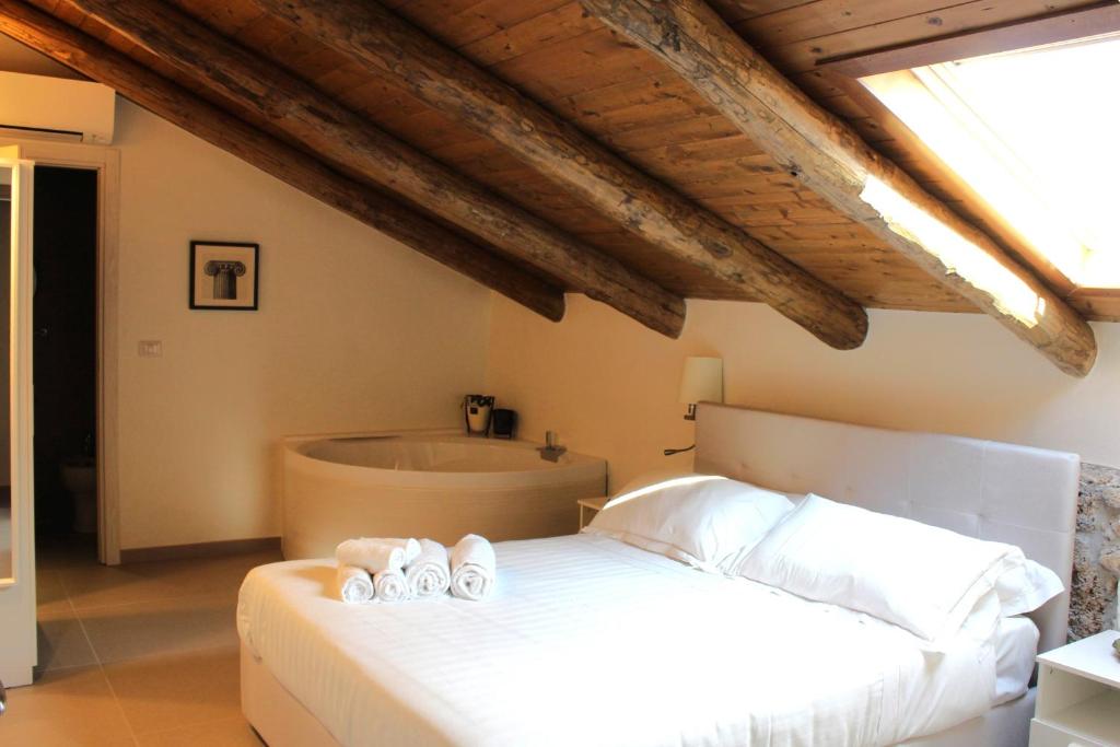 Postel nebo postele na pokoji v ubytování Casa Rubini