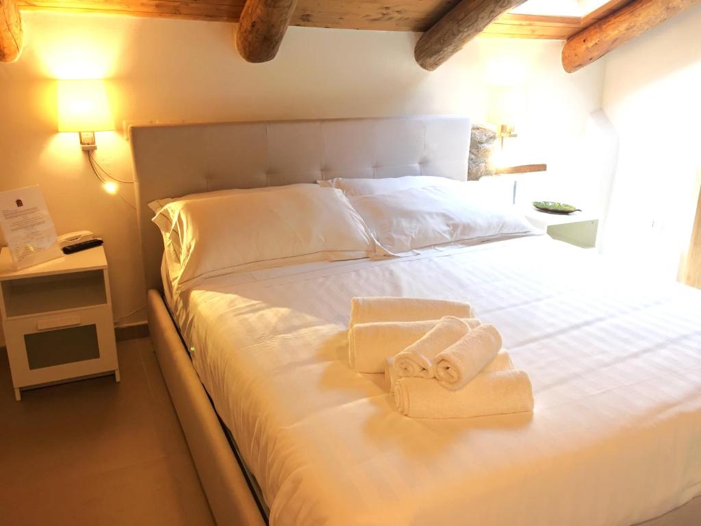 Postel nebo postele na pokoji v ubytování Casa Rubini