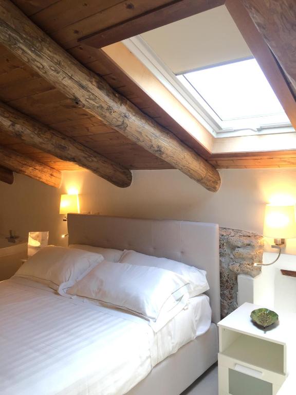 Postel nebo postele na pokoji v ubytování Casa Rubini