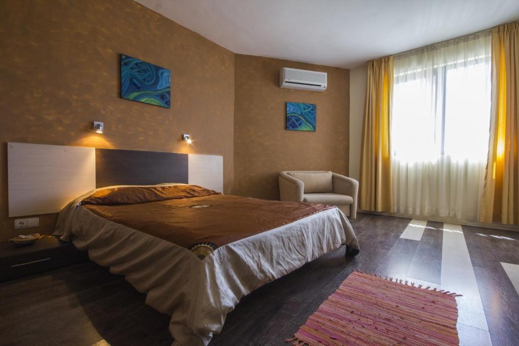 Postel nebo postele na pokoji v ubytování Coral Guest House