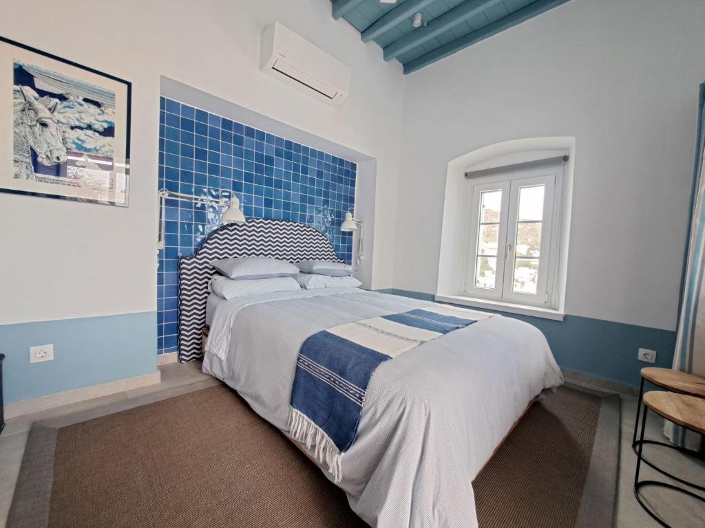 Postel nebo postele na pokoji v ubytování La Scaletta Guest House in Spilia Leros