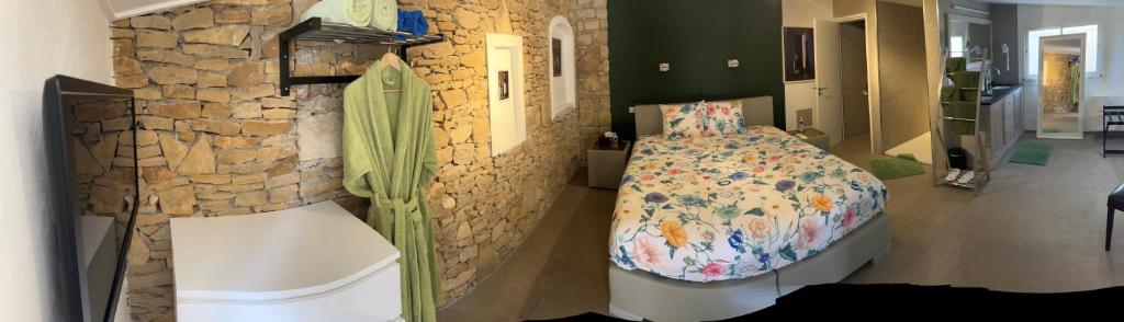Postel nebo postele na pokoji v ubytování Domaine de Claude