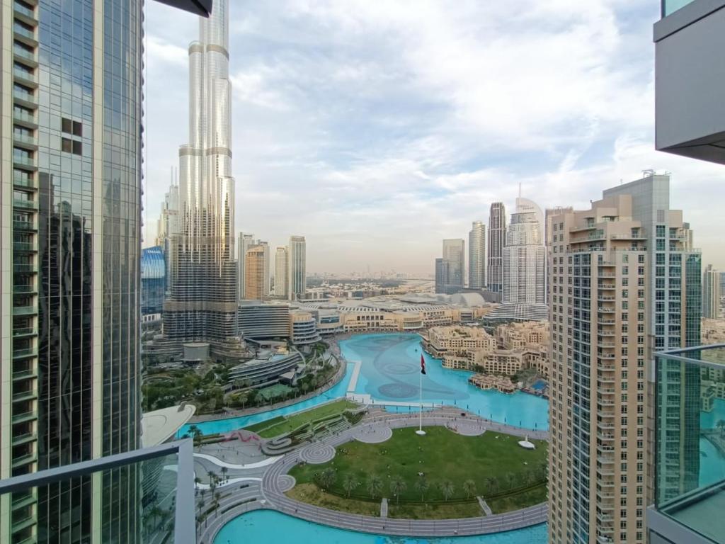 a view of a city with tall buildings at 3 BEDROOM APARTMENT ON MONTHLY RENT in Dubai